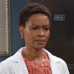 Dr. Gregory’s orange floral blouse on Days of our Lives