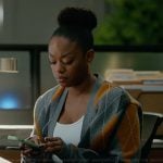 Izzy's gray argyle print cardigan on The Lincoln Lawyer