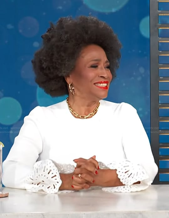 Jenifer Lewis’s white bell cuff ribbed top on Access Hollywood