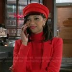 Kat’s red blazer and hat on Beyond the Gates
