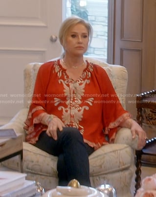 Kathy’s red print blouse on The Real Housewives of Beverly Hills