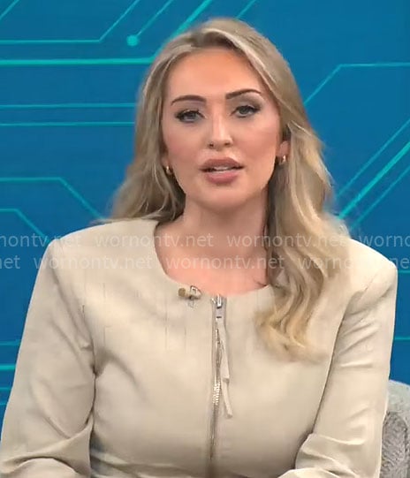 Kelly O'Grady's beige zip up jacket on CBS Mornings