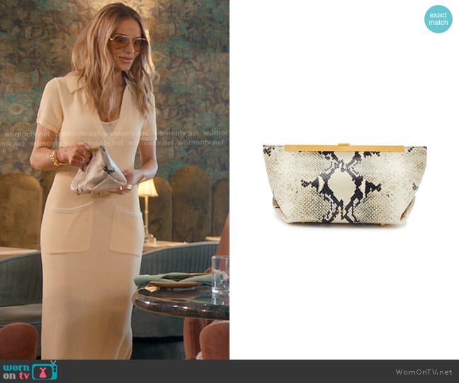 Khaite The Aimee Python-effect clutch Bag worn by Dorit Kemsley on The Real Housewives of Beverly Hills