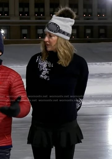 Lara’s black embellsihed sweater and goggle print beanie on Good Morning America