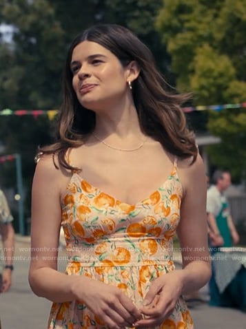 Megan’s pink fruit print dress on The Burbs