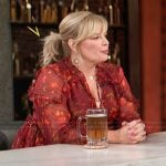 Melissa Peterman’s red floral print ruffle dress on Access Hollywood