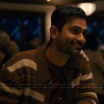 Naveen’s brown striped cardigan on The Burbs