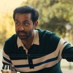 Naveen's green rugby stripe sweater on The Burbs