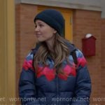 Novak’s navy puffer jacket with stripes on Chicago Fire