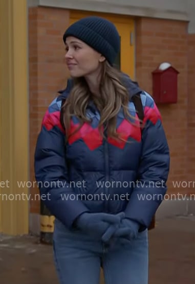 Novak’s navy puffer jacket with stripes on Chicago Fire