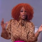 Olivia Crimmins’ leopard print tie neck blouse on The Jennifer Hudson Show