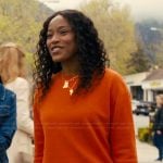 Samira’s orange sweater on The Burbs