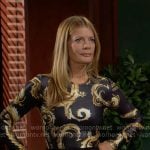Phyllis’s black and gold printed top and button front skirt on The Young and the Restless