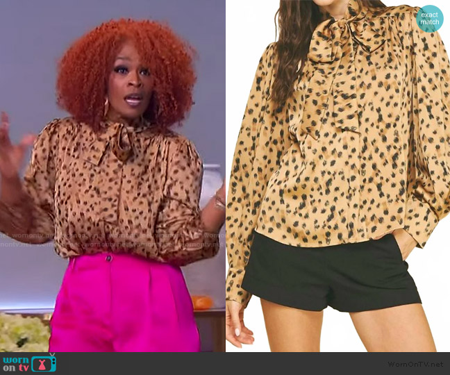 Pinch Evelyn tie neck blouse in leopard worn by Olivia Crimmins on The Jennifer Hudson Show