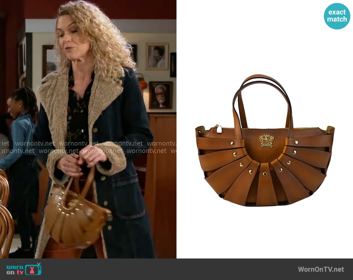 Pratesi Lucolena Clutch bag worn by Jan Morgan (Jerri Tubbs) on Beyond the Gates