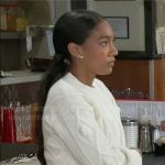 Samantha’s white rosette sweater and denim bubble skirt on Beyond the Gates