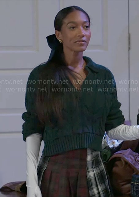 Samantha's green cable knit sweater and plaid skirt on Beyond the Gates