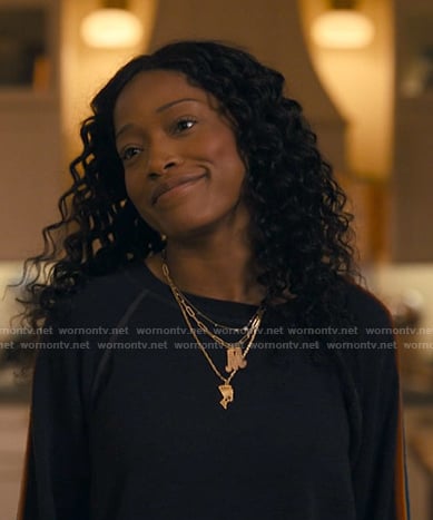 Samira's gold Egyptian pendant necklace on The Burbs