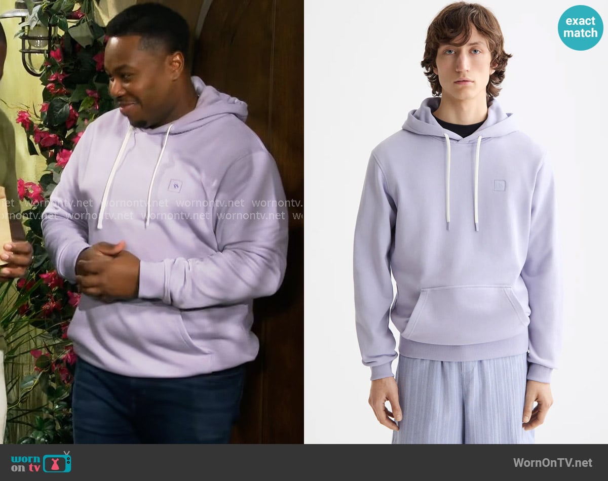 Scotch & Soda Logo Badge Hoodie in Languid Lavender worn by Marty (Marcel Spears) on The Neighborhood