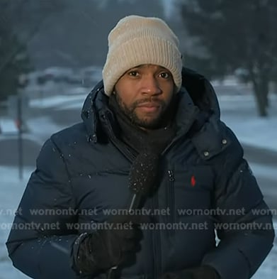 Shaquille Brewster's navy down jacket on NBC News Daily