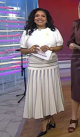 Sheinelle’s white short sleeve sweater and striped skirt on Today