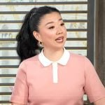 Sherry Cola’s pink contrast polo top on Access Hollywood