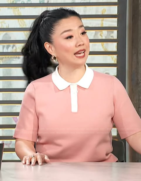 Sherry Cola’s pink contrast polo top on Access Hollywood