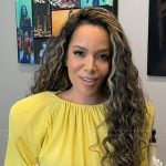 Sunny’s yellow padded shoulder dress on The View