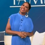 Tamron’s blue pleated button front dress on Tamron Hall Show