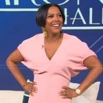 Tamron’s pink v-neck dress on Tamron Hall Show