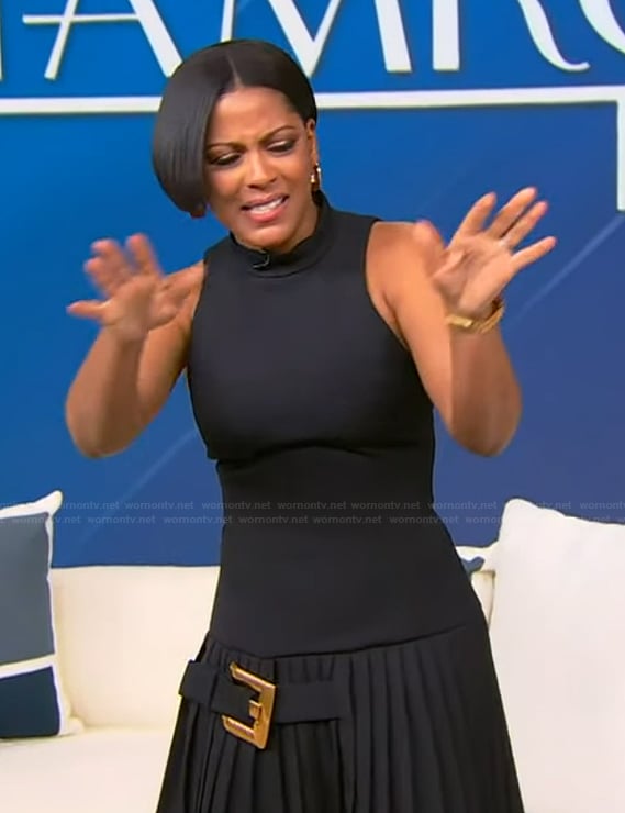 Tamron’s black buckle mini dress on Tamron Hall Show