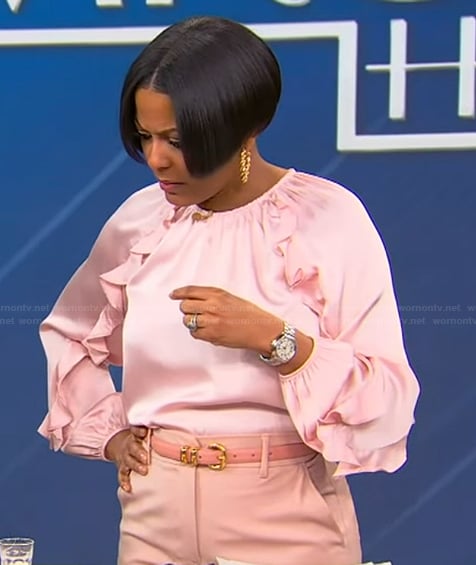 Tamron’s pink ruffle blouse on Tamron Hall Show