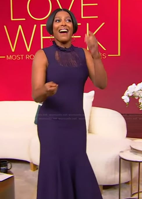 Tamron’s purple lace panel sleeveless dress on Tamron Hall Show