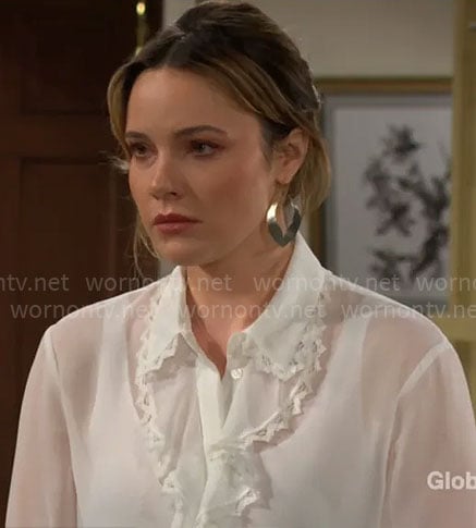 Tessa’s white ruffle blouse on The Young and the Restless