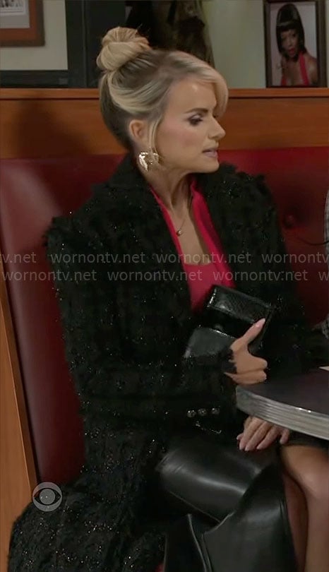 Vanessa's black tweed coat on Beyond the Gates