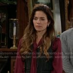 Victoria’s pinstripe vest with dark red tie neck blouse on The Young and the Restless