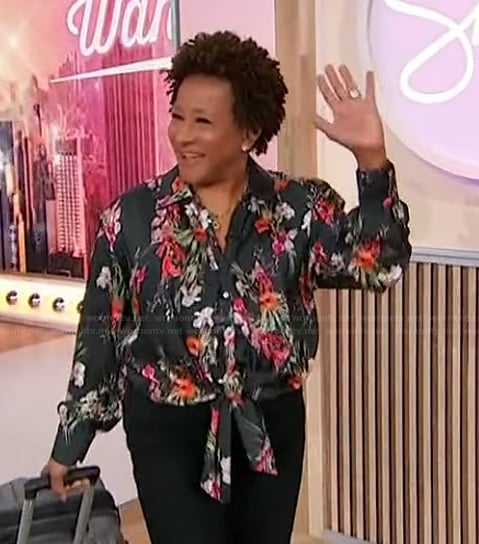 Wanda Sykes’s black floral print blouse on Sherri