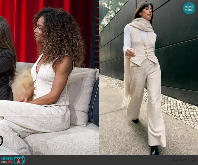 Zuri’s white tweed vest on Access Hollywood