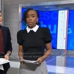 Zinhle’s black collared sweater and grey asymmetric skirt on NBC News Daily
