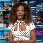 Zuri’s white polka dot print tie neck dress on Access Hollywood
