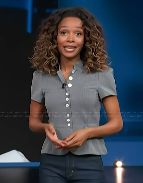 Zuri’s gray peplum top on Access Hollywood
