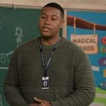 Dominic’s green knit sweater on Abbott Elementary