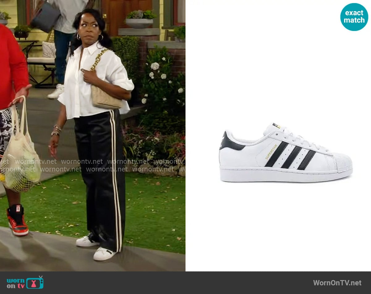 Adidas Superstar Sneakers worn by Tina Butler (Tichina Arnold) on The Neighborhood
