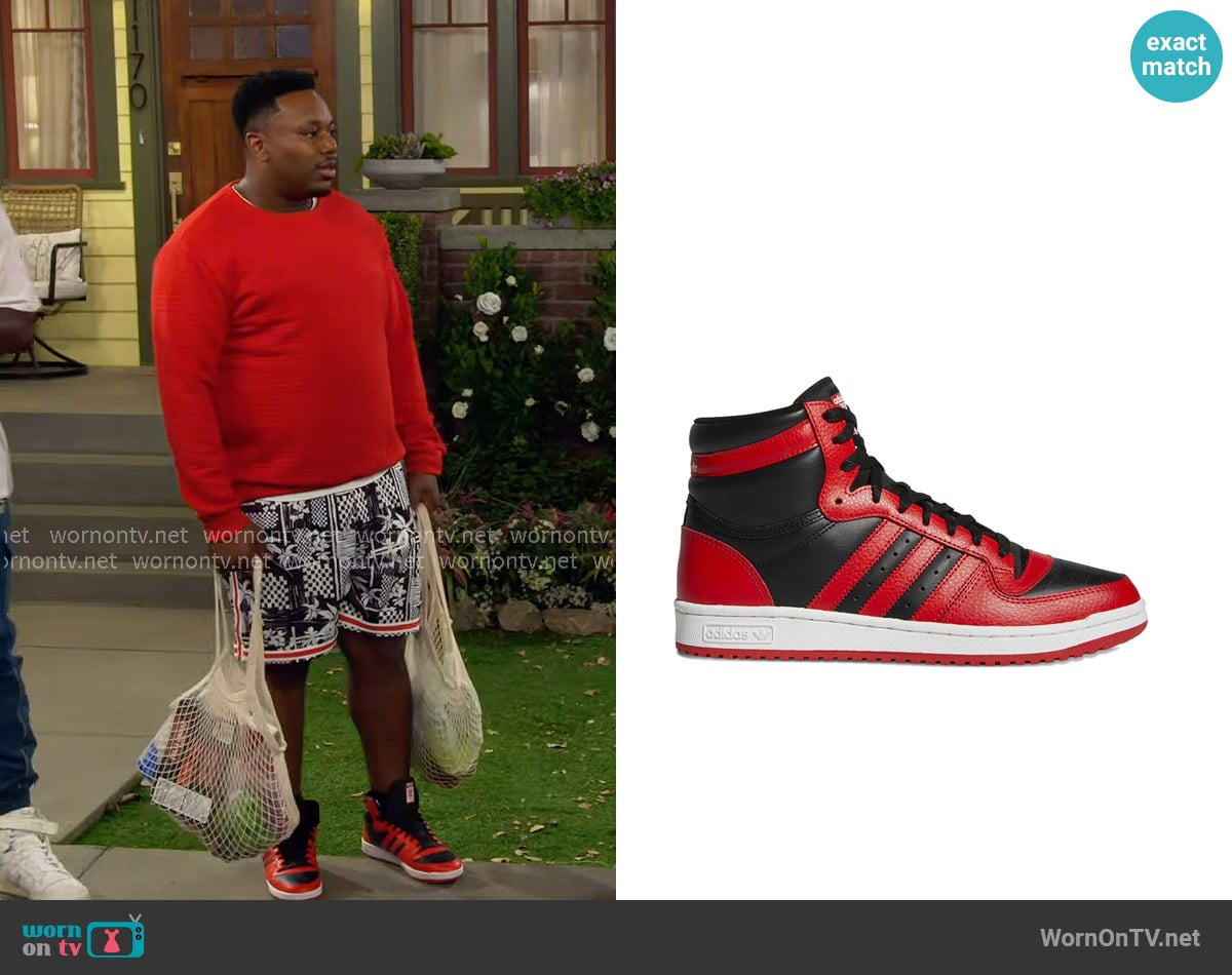 Adidas Top Ten sneakers worn by Marty (Marcel Spears) on The Neighborhood