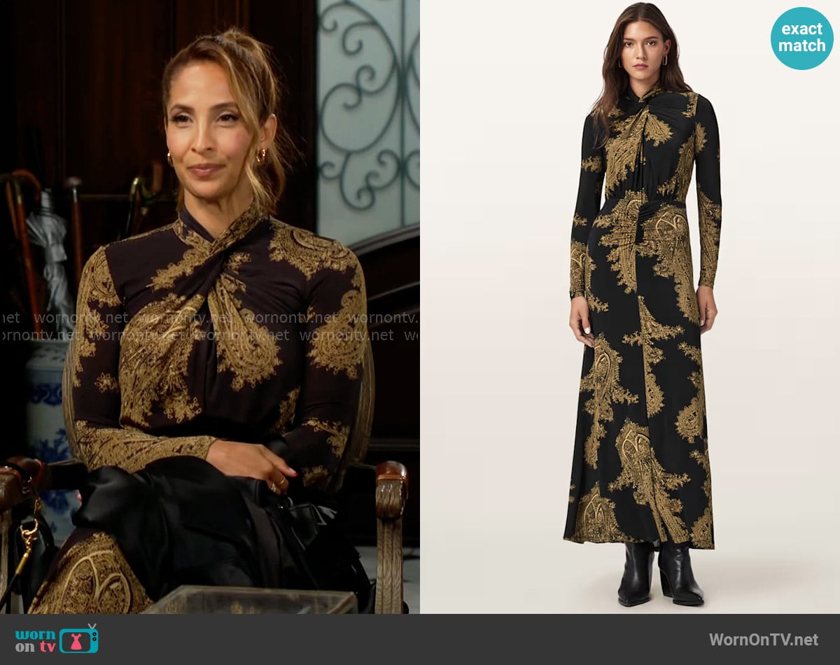 Lily’s black and gold printed cross-neck dress on The Young and the Restless