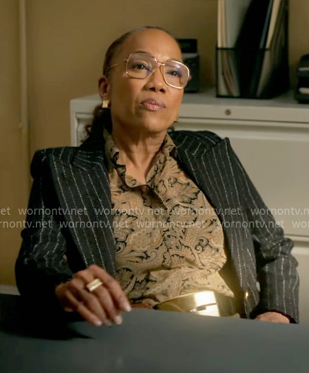 Amanda's paisley print blouse and black pinstripe blazer on Will Trent