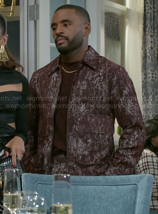 Andre’s burgundy jacket and pants set on Beyond the Gates