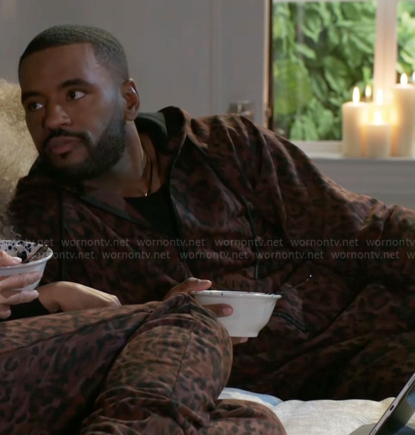 Andre's leopard print onesie on Beyond the Gates