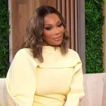 Angela Oakley’s yellow mini cape dress on Sherri