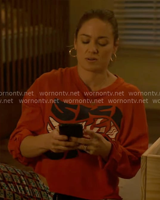 Angie's red SKI SKI SKI tee on Will Trent